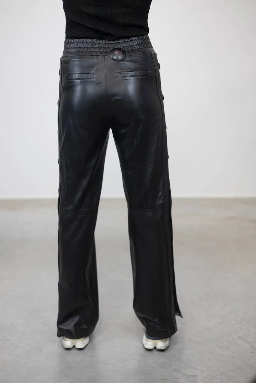 POPPER RELAXED FIT LEATHER PANTS WITH SIDE BUTTONS