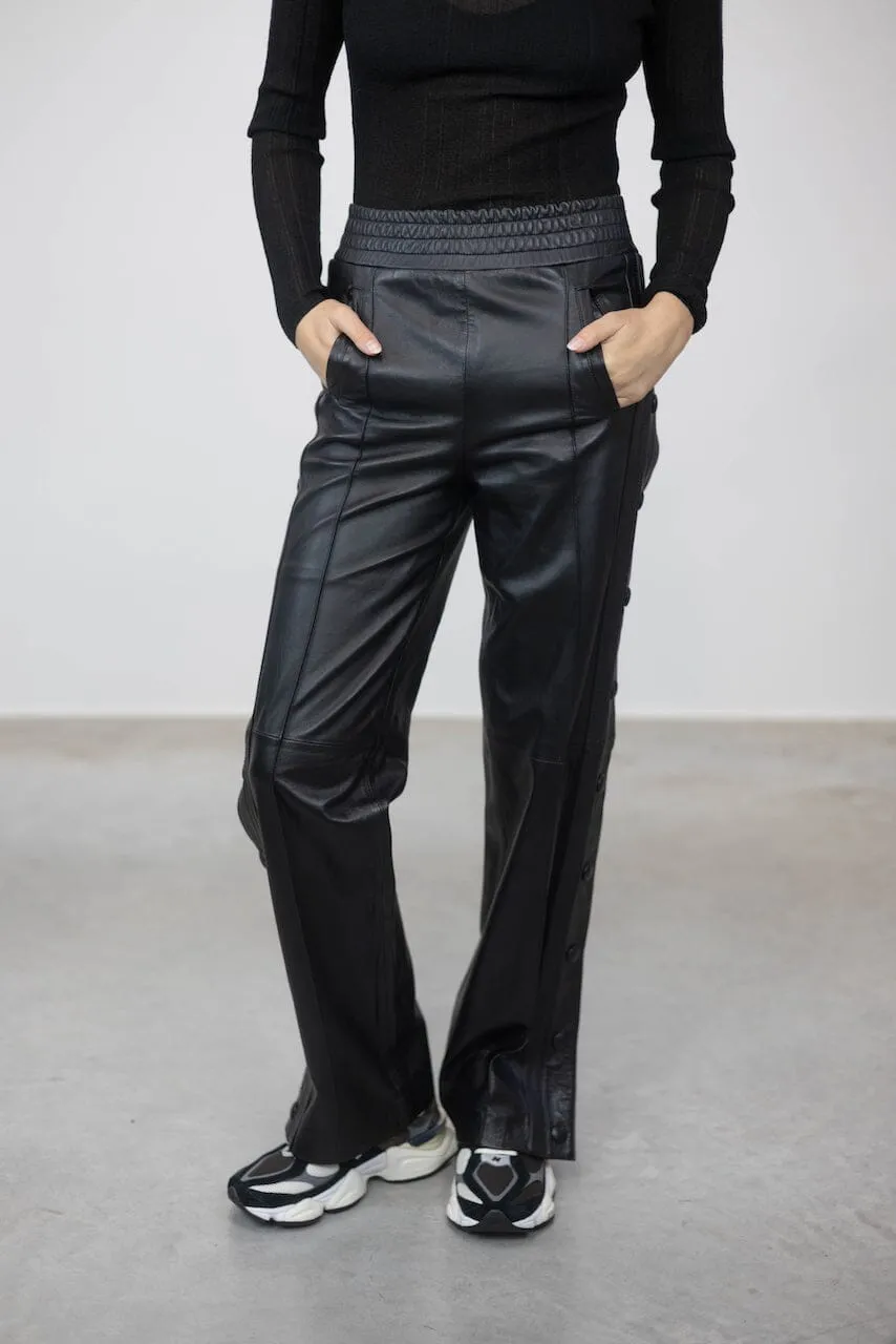 POPPER RELAXED FIT LEATHER PANTS WITH SIDE BUTTONS